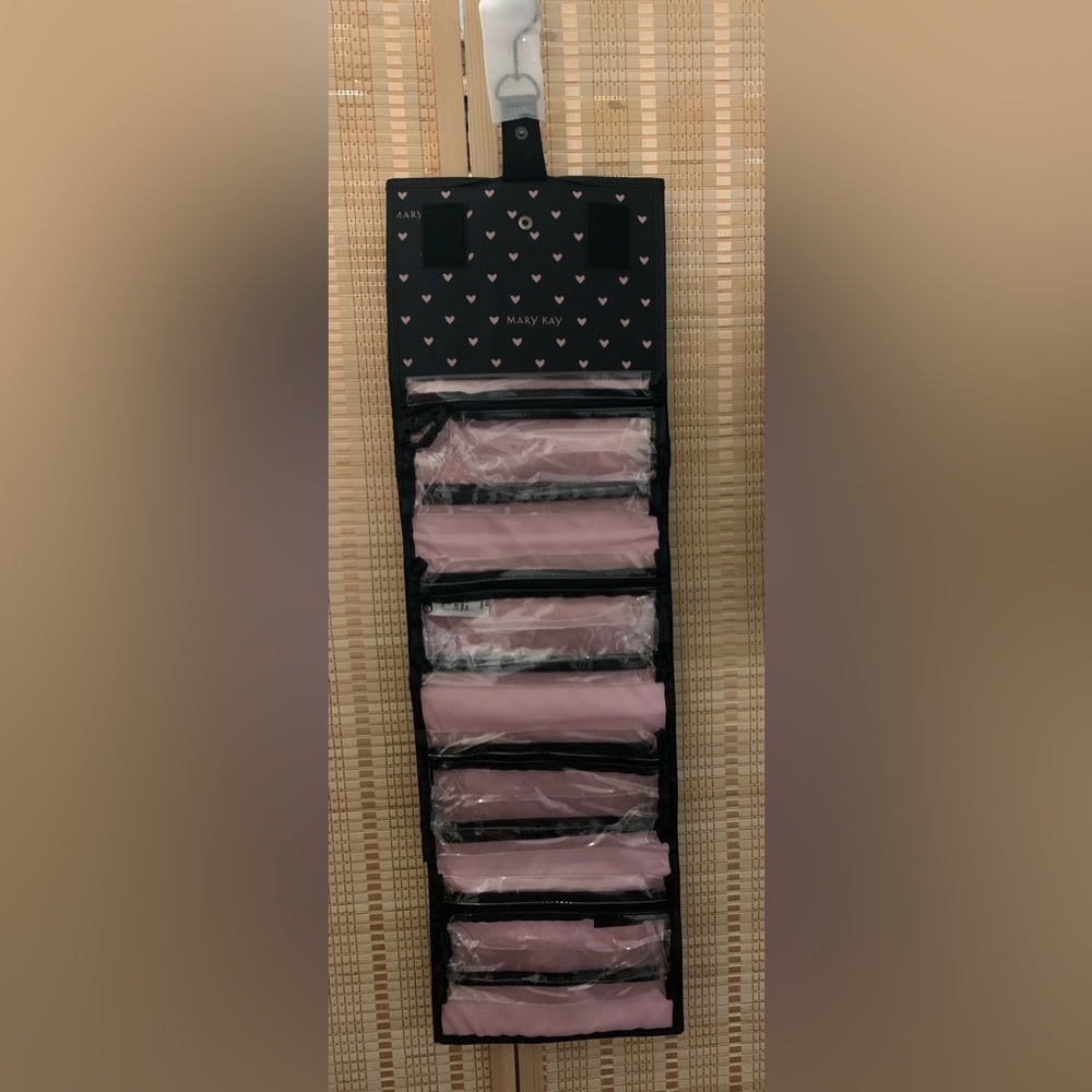 Mary Kay® Travel Roll-Up Bag in black with pink heart accents (unfilled)